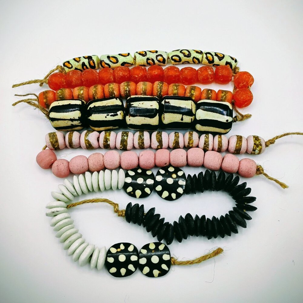 Detash beads lot: 5 strands  in black, white, pink and orange